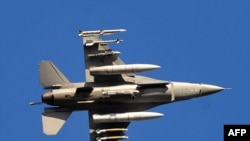 A U.S. F-16 takes off from the air base at Aviano, Italy, on March 21.