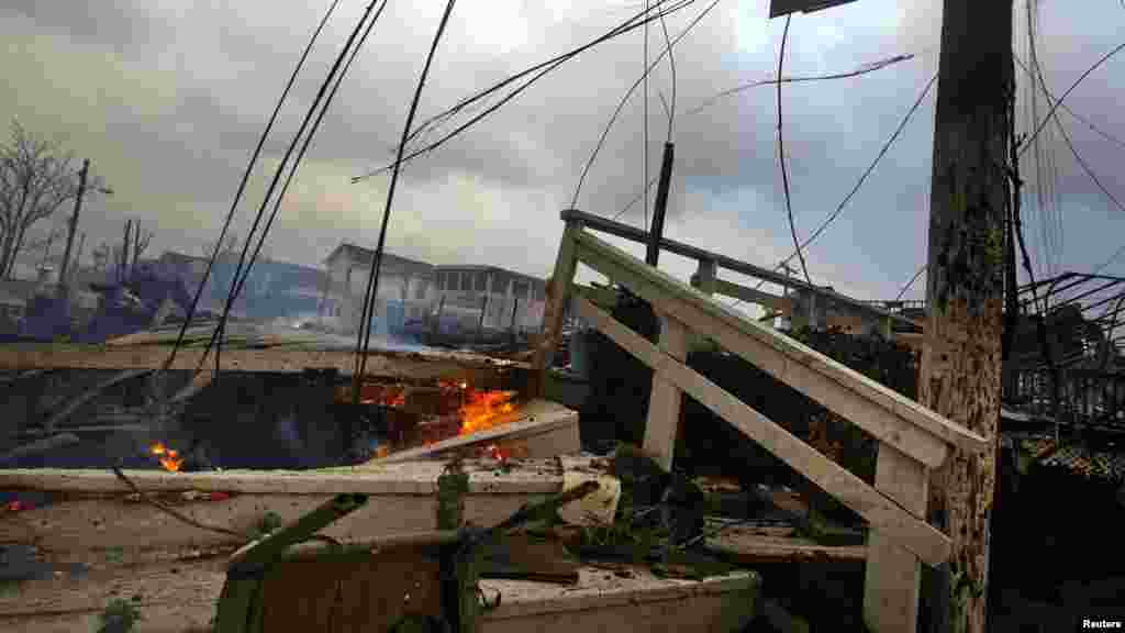 Homes devastated by fire and the effects of Hurricane Sandy are seen in the Breezy Point section of Queens, New York.