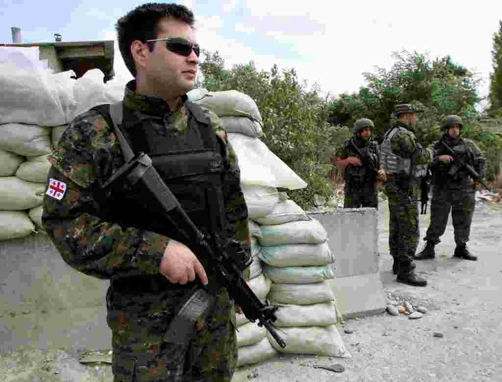 Georgian soldiers take up positions near the village of Ergneti in South Ossetia on August 5 amid the buildup to the war.