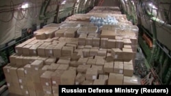 The Russian military transport plane, loaded with medical equipment, ahead of its departure to the United States at an airport outside Moscow on April 1.