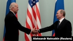 Joe Biden meets face-to-face with Vladimir Putin in Moscow in March 2011. 