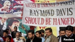 Pakistani protesters demand the death penalty for Raymond Davis in Lahore.