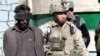 Could Afghan, Iraqi Insurgencies Muster Ties?