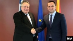 Macedonian Deputy Prime Minister Bujar Osmani (right) with Greek Foreign Minister Nikos Kotzias in Athens. 