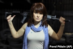 Butina at a shooting range in Moscow in April 2012