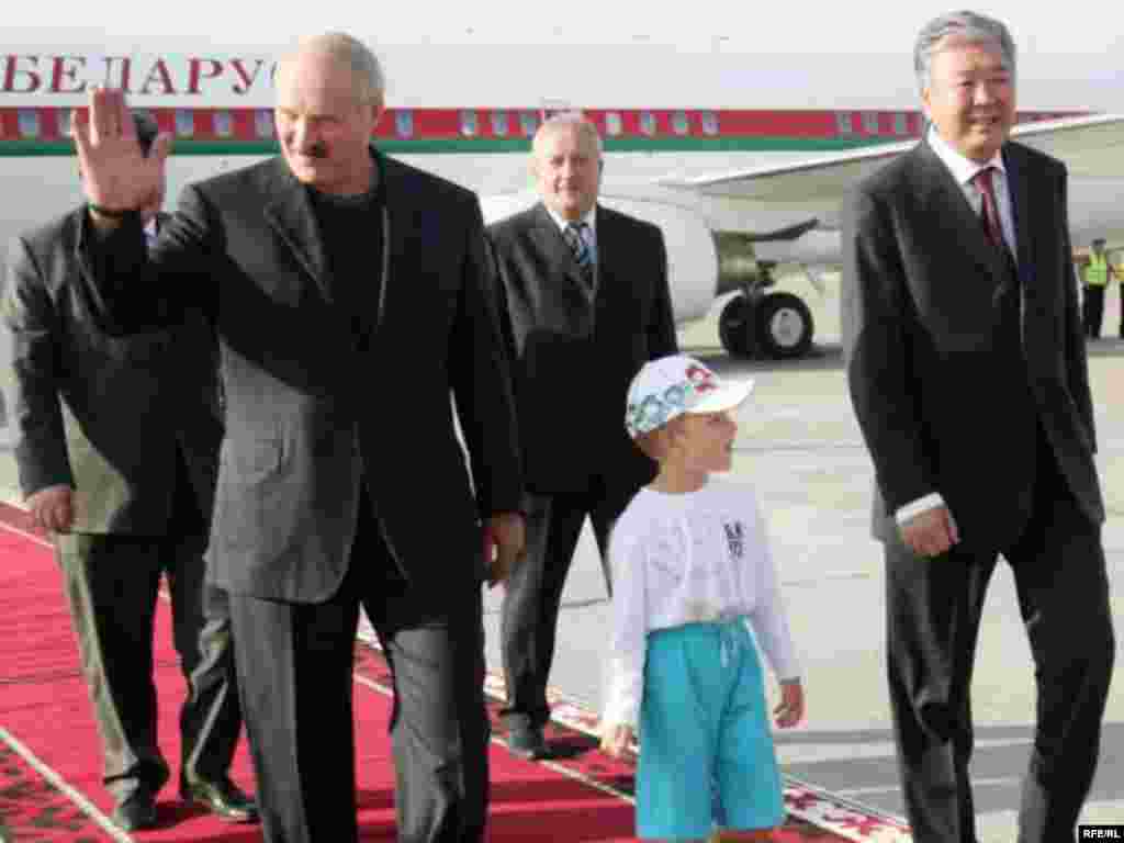 Lukashenka and Kolya arrive in Bishkek in July 2009.