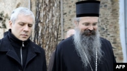 Serbian President Boris Tadic (left) with Bishop Teodosije outside Visoki Decani Monastery on January 6