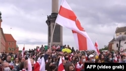 Belarusians rally against Lukashenka's government in Warsaw on May 29.