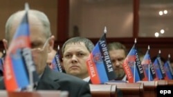 Deputies attend a first session of the self-proclaimed Donetsk People's Republic parliament in Donetsk on November 14, 2014.