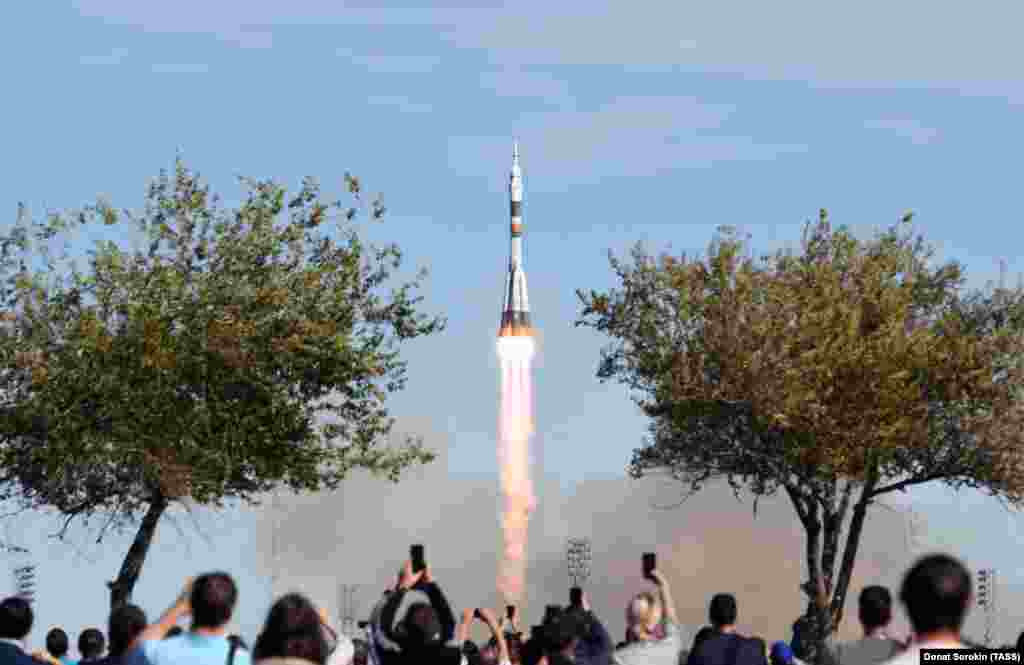 The Soyuz MS-10 spacecraft blasts off.