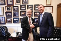 Kosovo's then-speaker of parliament, Kadri Veseli, meets in Washington with Eliot Engel in 2019.