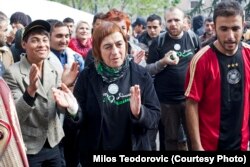 Stasa Zajovic (center) with refugees and migrants taken in Subotica, Serbia.