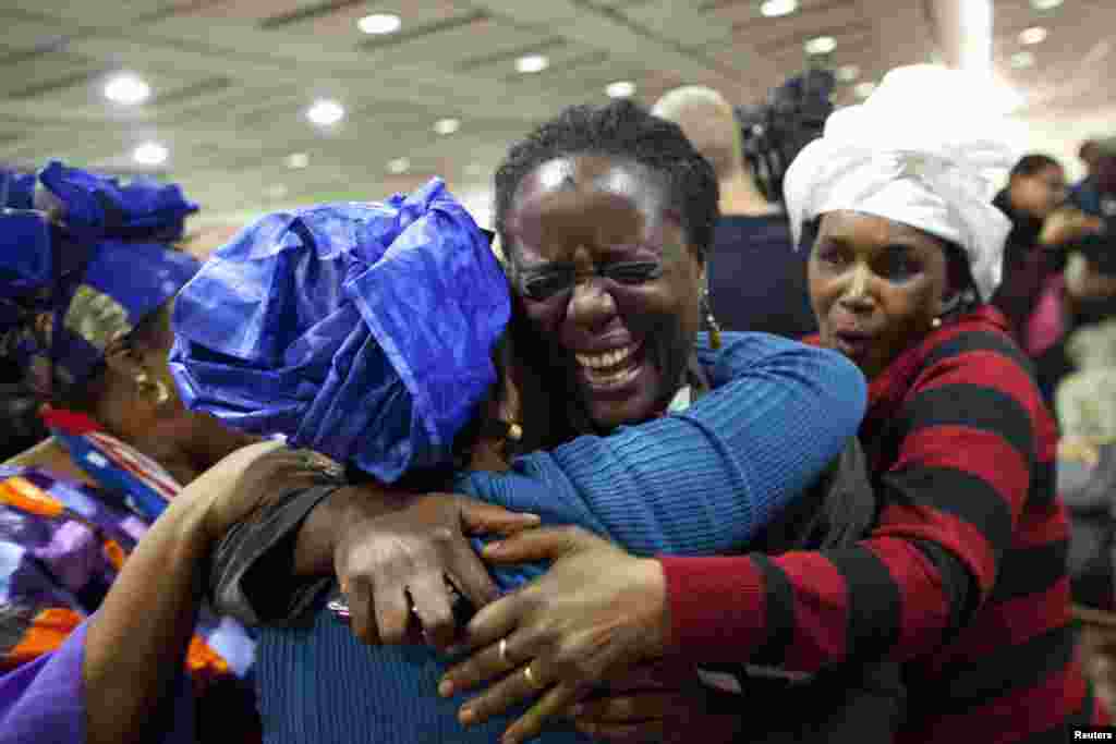 Obama supporters celebrate at the Harlem State Office building in New York.