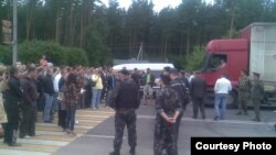 Protesters rally at the Belarusian-Polish border crossing near Hrodna on June 12.