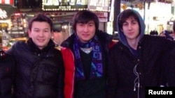 Boston Marathon bombing suspect Dzhokhar Tsarnaev (right) poses with Azamat Tazhayakov (left) and Dias Kadyrbaev in an undated photo taken in New York City.