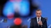 NATO Secretary-General Jens Stoltenberg speaks to reporters after an extraordinary meeting of NATO foreign ministers in Brussels on January 7.