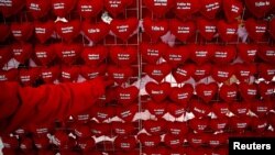 A vendor in the central Bosnian town of Zenica sells heart-shaped cushions with proclamations of love for 1 euro each.