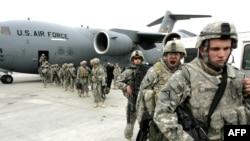 U.S. soldiers arrive at Manas from Afghanistan earlier this year.