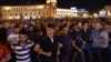 Supporters of the opposition hold a protest march in support of the gunmen in Yerevan on July 26.