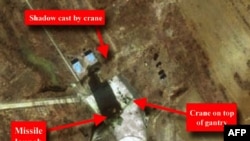 A satellite image from March 26 that was released by The Institute for Science and International Security (ISIS) in Washington and purportedly showing a long-range missile on a launch pad at Musudan-Ri