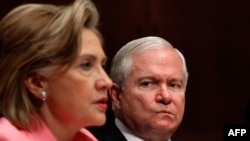 U.S. Secretary of State Hillary Clinton and Defense Secretary Robert Gates (file photo)