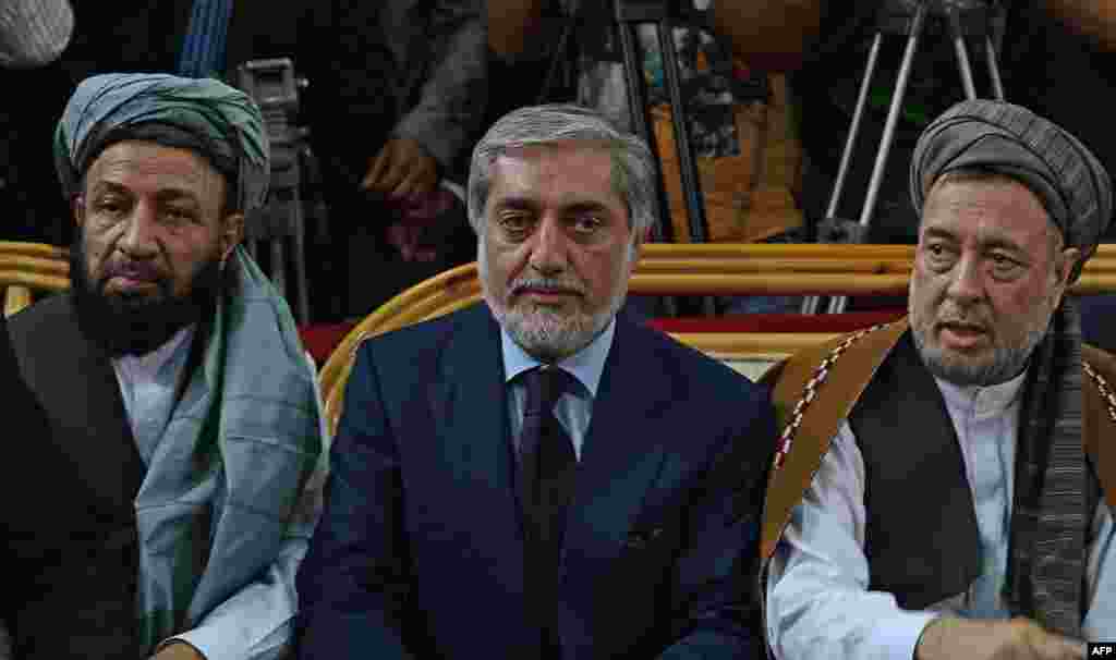 Abdullah Abdullah (center) ethnic Tajik Vice-presidential running mates: Mohammad Khan (Pashtun) (left in photo), Mohammad Mohaqeq (Hazara) (right in photo) Abdullah (born in 1960) is a former foreign minister and qualified eye surgeon. He finished second behind President Hamid Karzai in the 2009 presidential election, with around 30 percent of the vote. The Jamiat-e Islami and Hezb-e Islami were deadly rivals during Afghanistan's civil war, but that did not prevent Jamiat-e Islami member Abdullah from adding Hezb-e Islami associate Khan to his ticket.