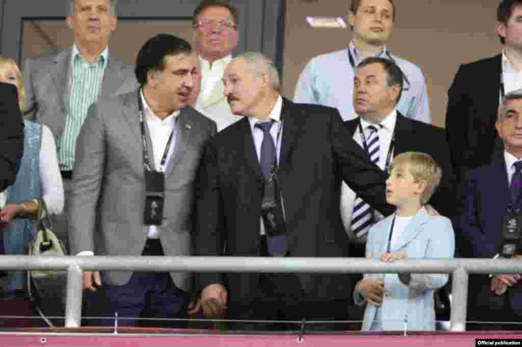 Kolya and his father with then-Georgian President Mikheil Saakashvili at the Euro 2012 finals in Kyiv.