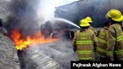 A rocket attack struck this fuel tanker carrying NATO supplies in the eastern Afghan province of Nangarhar in November 2009.