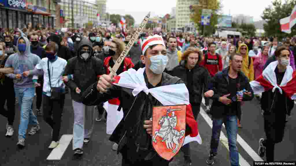 Belarusian opposition supporters attend a rally in Minsk.