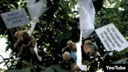 Hundreds of toy bears bearing pro-democracy messages were parachuted into Minsk by a Swedish PR firm. 