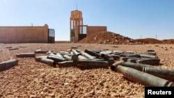 Empty bullet casings are seen at a base in the Raqqa countryside used by Kurdish fighters after Islamic State fighters said they took control of the area.