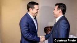 Macedonian Prime Minister Zoran Zaev (right) met his Greek counterpart Alexis Tsipras on the sidelines of the World Economic Forum in Davos on January 24. 