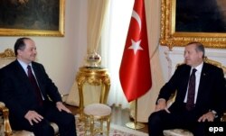 Iraqi Kurdish leader Masud Barzani (left) meets with Turkish Prime Minister Recep Tayyip Erdogan in Ankara on July 14.