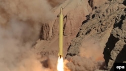 Iran -- An Iranian long range missile Qadr is launched at an undisclosed location in Iran, March 9, 2016