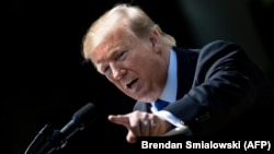 U.S. President Donald Trump speaks at the National Day of Prayer Service the White House in Washington on May 2.