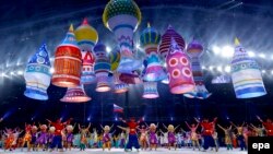 Dancers perform amid a balloon display representing Moscow's St. Basil's Cathedral during the opening ceremony for the Sochi Winter Olympics on February 7.