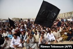 Supporters and activists of the Pashtun Protection Movement (PTM) at a rally in Karachi in May