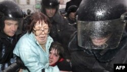 Russian riot police detain opposition activists during a rally in Moscow in March.