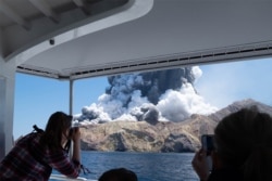 Steam and ash spewing over Whakaari/White Island on December 9 (courtesy of Michael Schade).