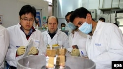 An International Atomic Energy Agency (IAEA) team checks the enrichment process inside Iran's uranium-enrichment plant at Natanz earlier this year.