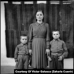 Tamara Cusnir poses with her two younger brothers. She was 16 years old at the time.