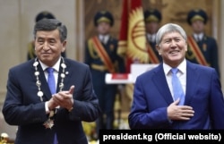 Happier times: Atambaev (right) with Kyrgyz President Sooronbai Jeenbekov at Jeenbekov's inauguration in November 2017