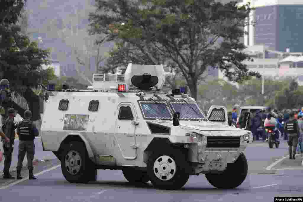 A military vehicle blocks an avenue next to the air base.&nbsp;