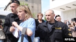 Police arrest participants in the Minsk gay-pride march on May 15.