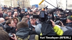 Opposition leader Boris Nemtsov is surrounded by cameras at the March 17 demonstration on Moscow's Pushkin Square.