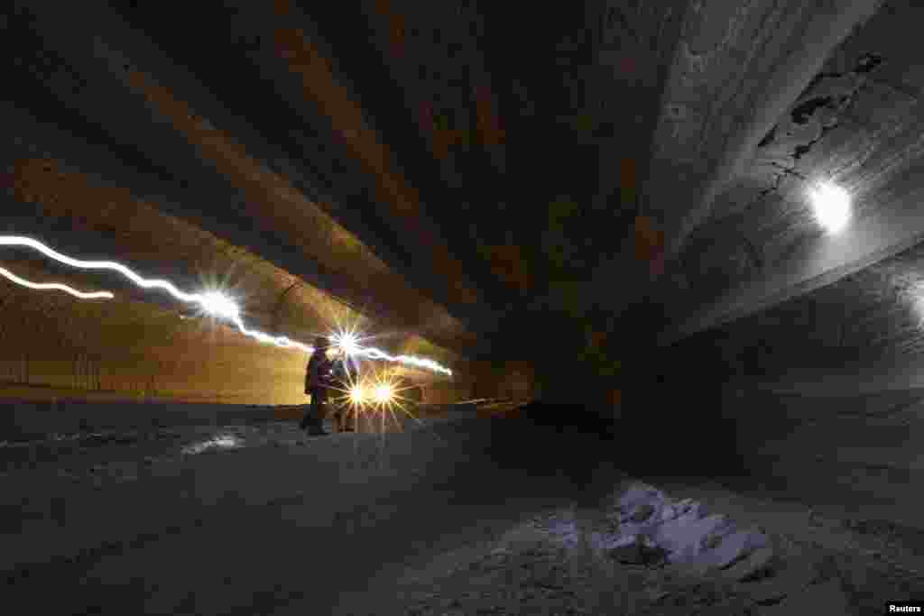 Employees at work in a Uralkali potash mine. The mineral is used mainly in fertilizer production, and is one of the three most widely-used fertilizers worldwide.