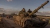 Ukrainian soldiers operate a Soviet-made T-72 tank in the Sumy region, near the border with Russia, on August 12.