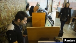 Browsers at an Internet cafe in Tehran (file photo)