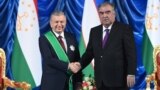 Uzbek President Shavkat Mirziyoev (left) and his Tajik counterpart, Emomali Rahmon, in Dushanbe on June 10. The new Uzbek leader has helped establish a much friendlier relationship with Tajikistan.