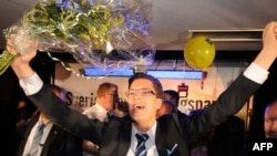 Jimmie Aakesson, leader of the far-right Sweden Democrats, celebrates after the results came in on September 19.